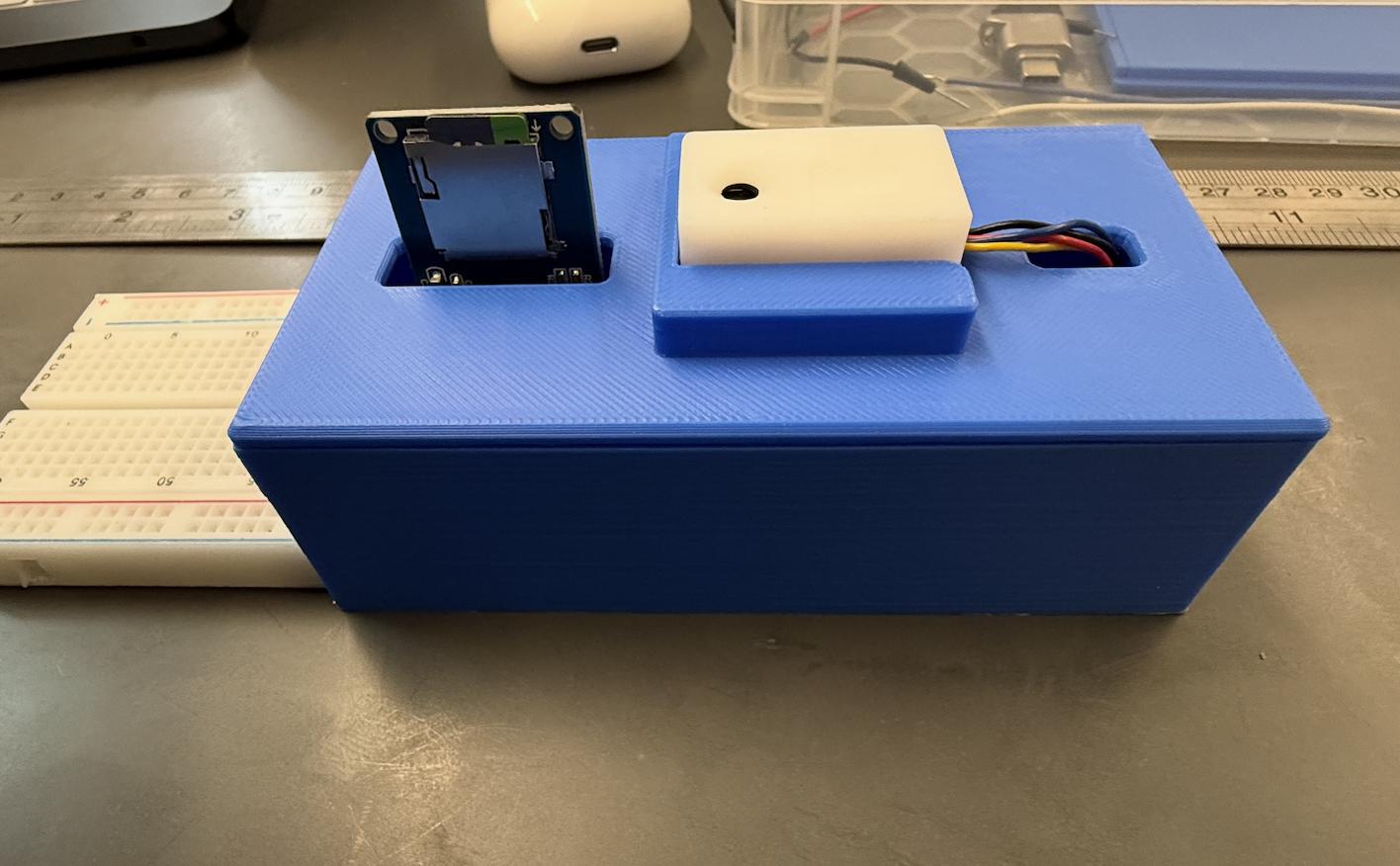 Air Quality Station — 3D-printed blue enclosure with sensor module